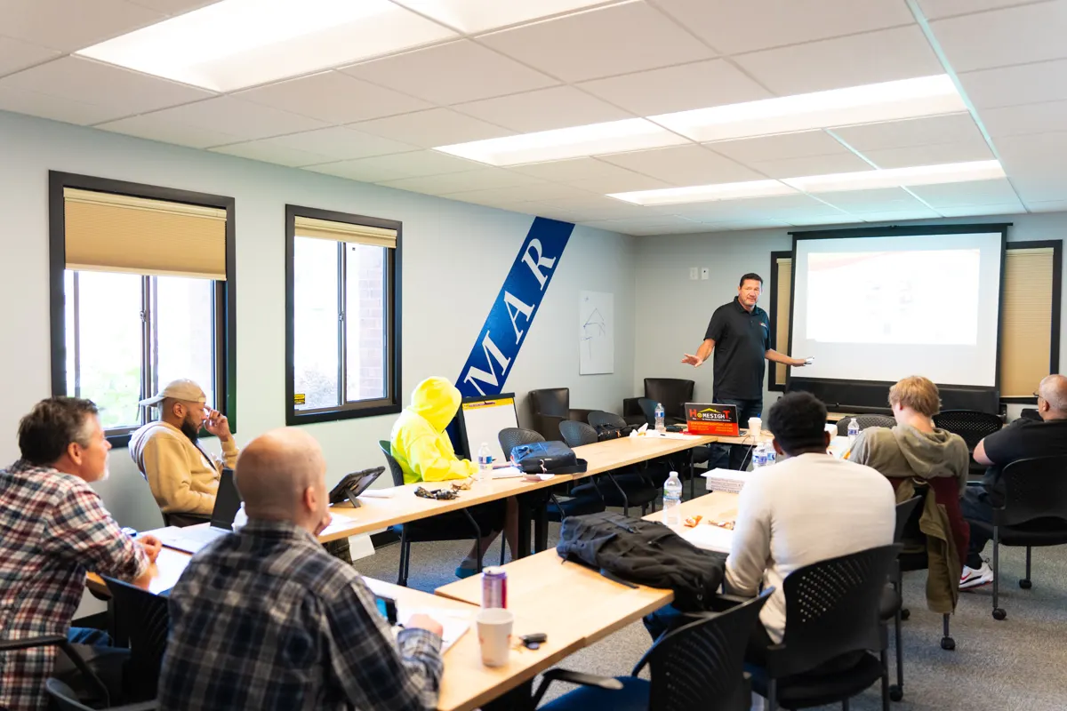 Academy students in the Milwaukee classroom during a lecture